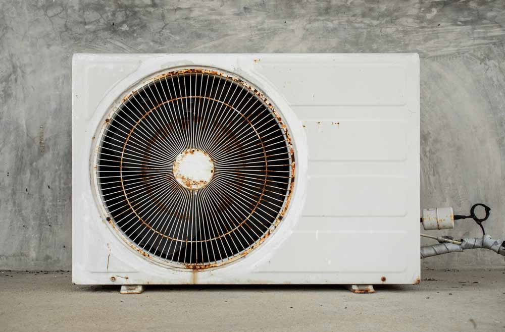 Old, worn-out AC unit in Tulsa, OK
